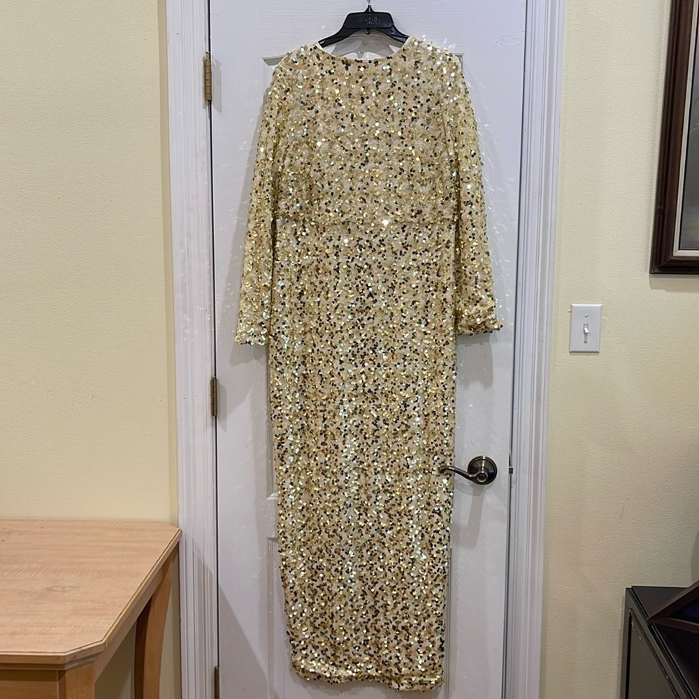 Gold sequence, dress, zips and back, split and back, no pockets, fits Size M/L